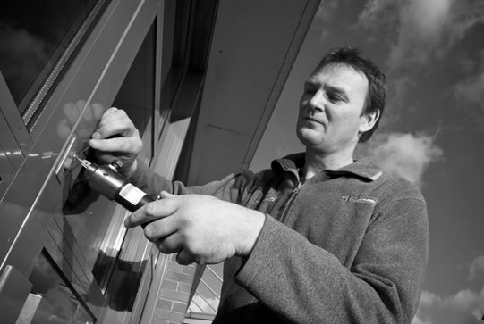 Stephen drilling a broken lock